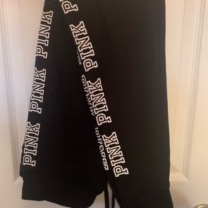 Pink. Yoga pants. Black with white lettering. Medium.